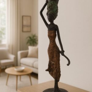 Sculpture bronze femme panier – silhouette africaine élégante portant un panier
